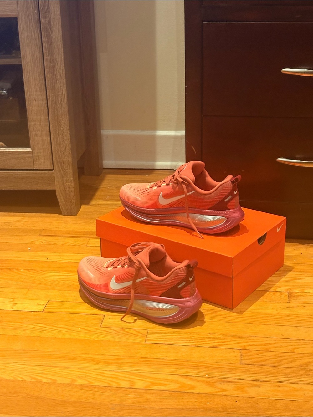 Nike Women’s Coral-Pink Running Sneakers with White Swoosh